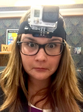 Maggie wearing a GoPro camera on her head.