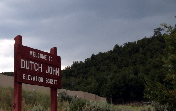 Sign that reads "Welcome to Dutch John Elevation 6312 FT."