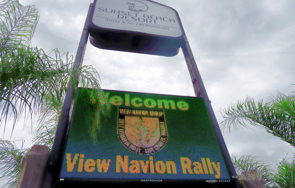 Sign at entrance to Sunset Beach Resort welcoming attendees to the View Navion Rally.