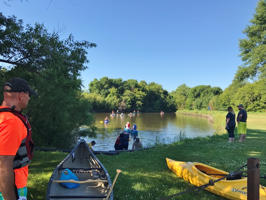 People kayaking the Winnebago river.