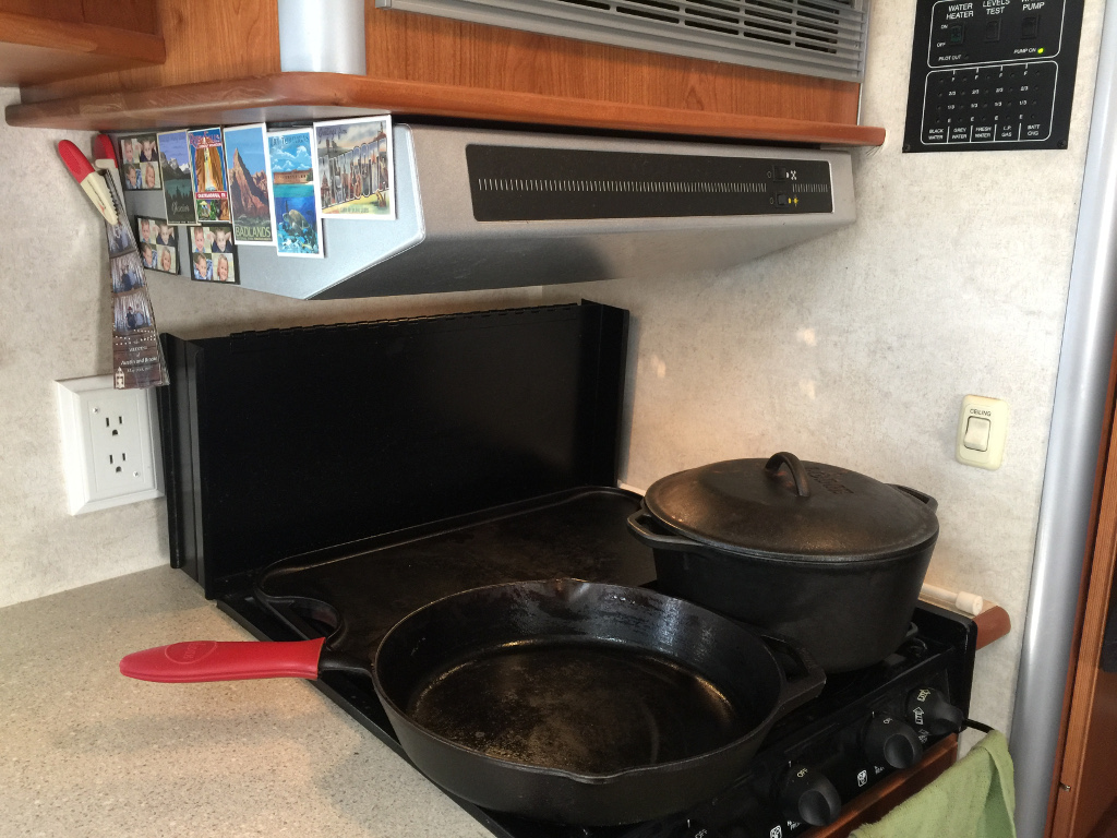 Pot and skillet on stove top