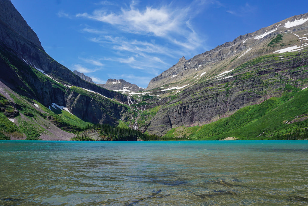Grinnell Lake with moutains surrounding